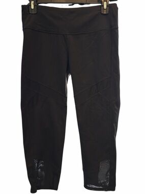 Athleta black Capri leggings with mesh detailing at the calves  EC Size medium